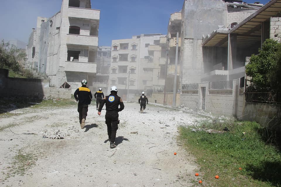 Running to help after airstrike in Jisr Al-Shughour